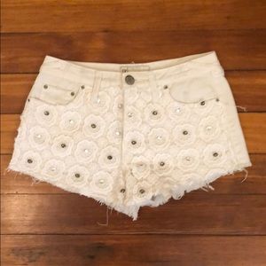 Free people white lace and stud shorts